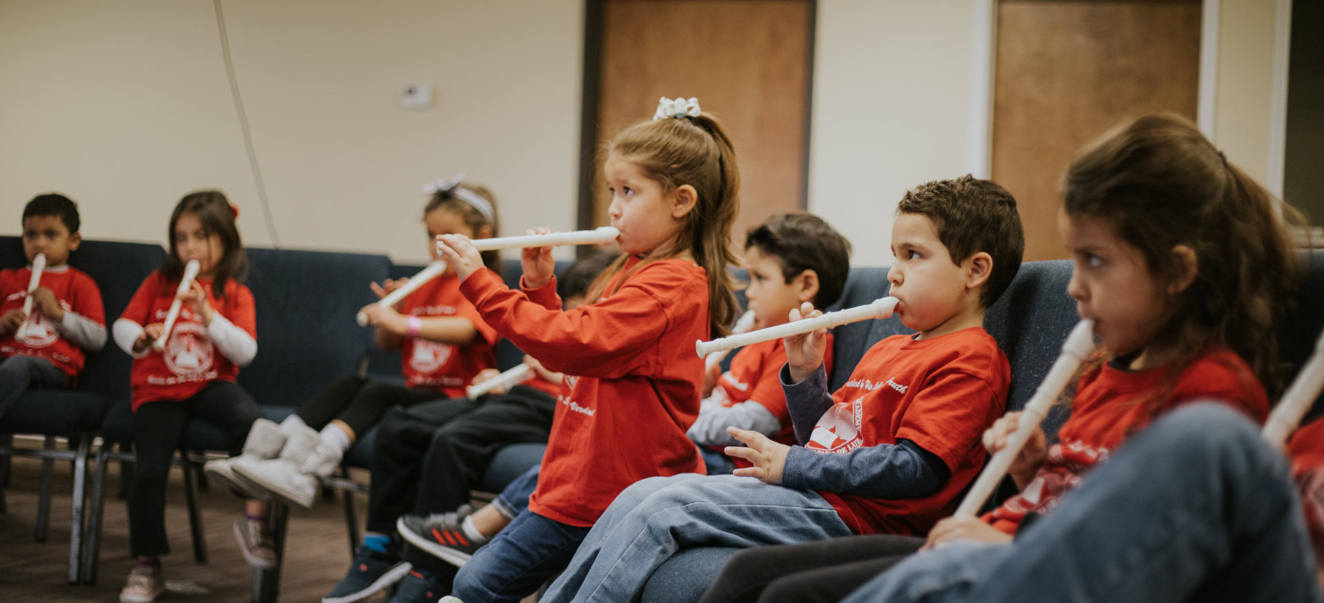 kids having a flute lesson
